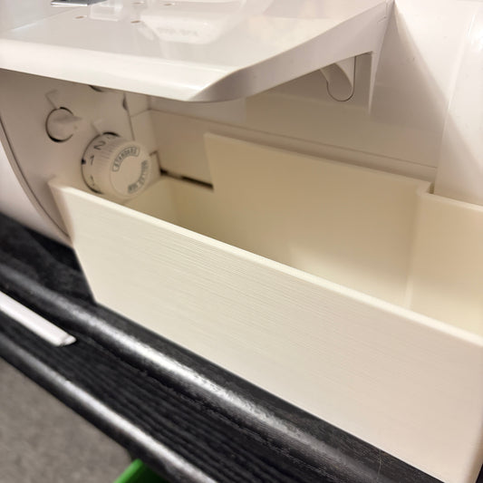 Improved thread catcher for Baby Lock Triumph with magnetic needle catcher