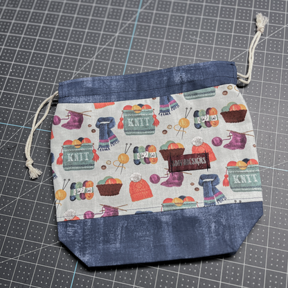 Sock knitting project bag with divider and snap tabs