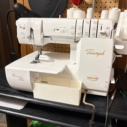 Improved thread catcher for Baby Lock Triumph with magnetic needle catcher