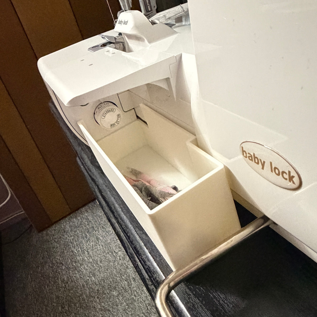 Improved thread catcher for Baby Lock Triumph with magnetic needle catcher