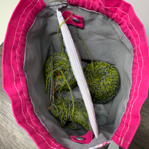 Sock knitting project bag with divider and snap tabs