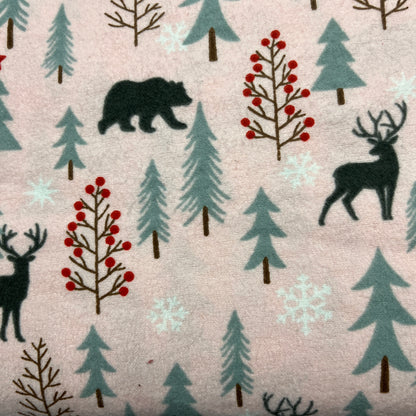 Trees, berries, snowflakes, bear and deer with pink background and pink backing