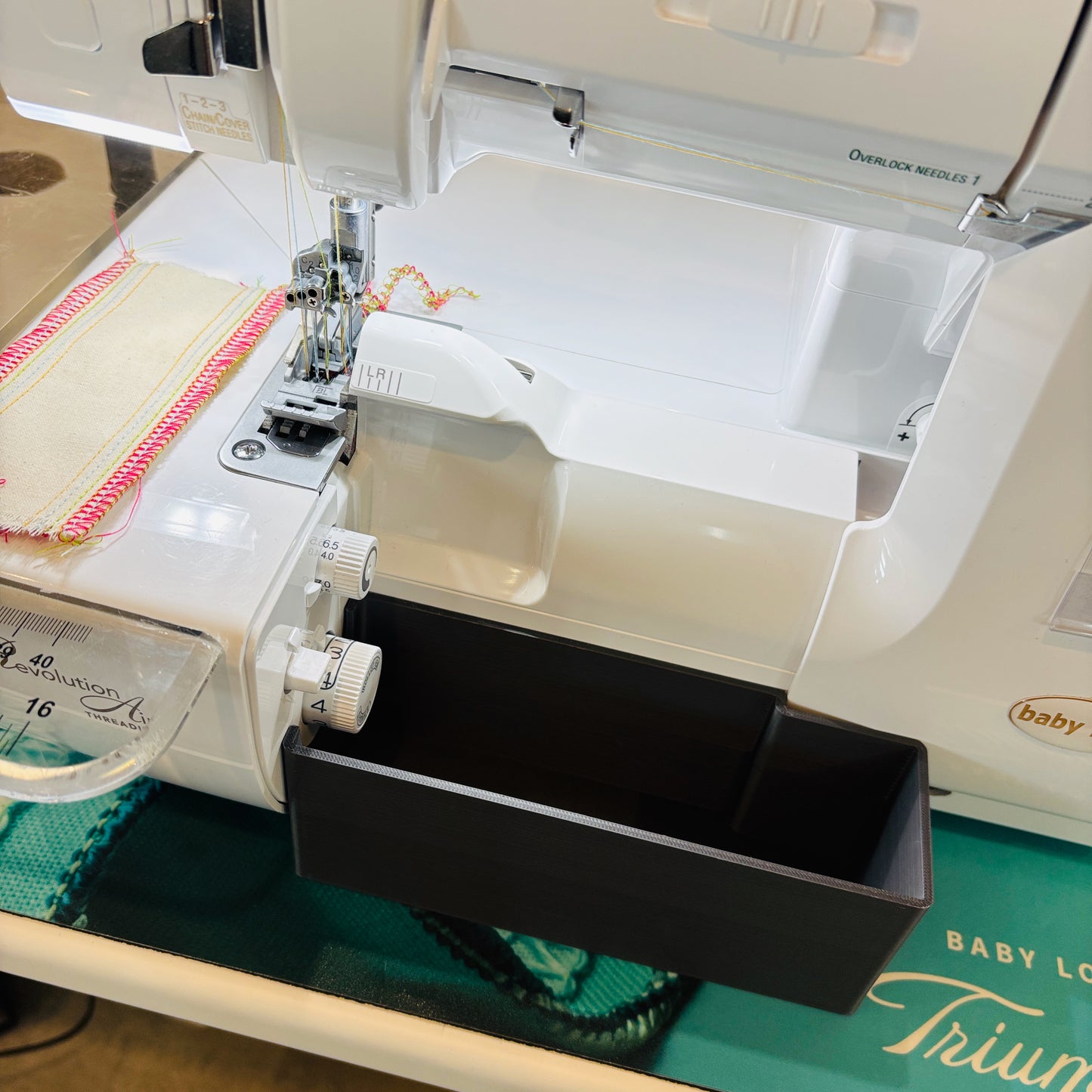 Thread catcher for Baby Lock serger